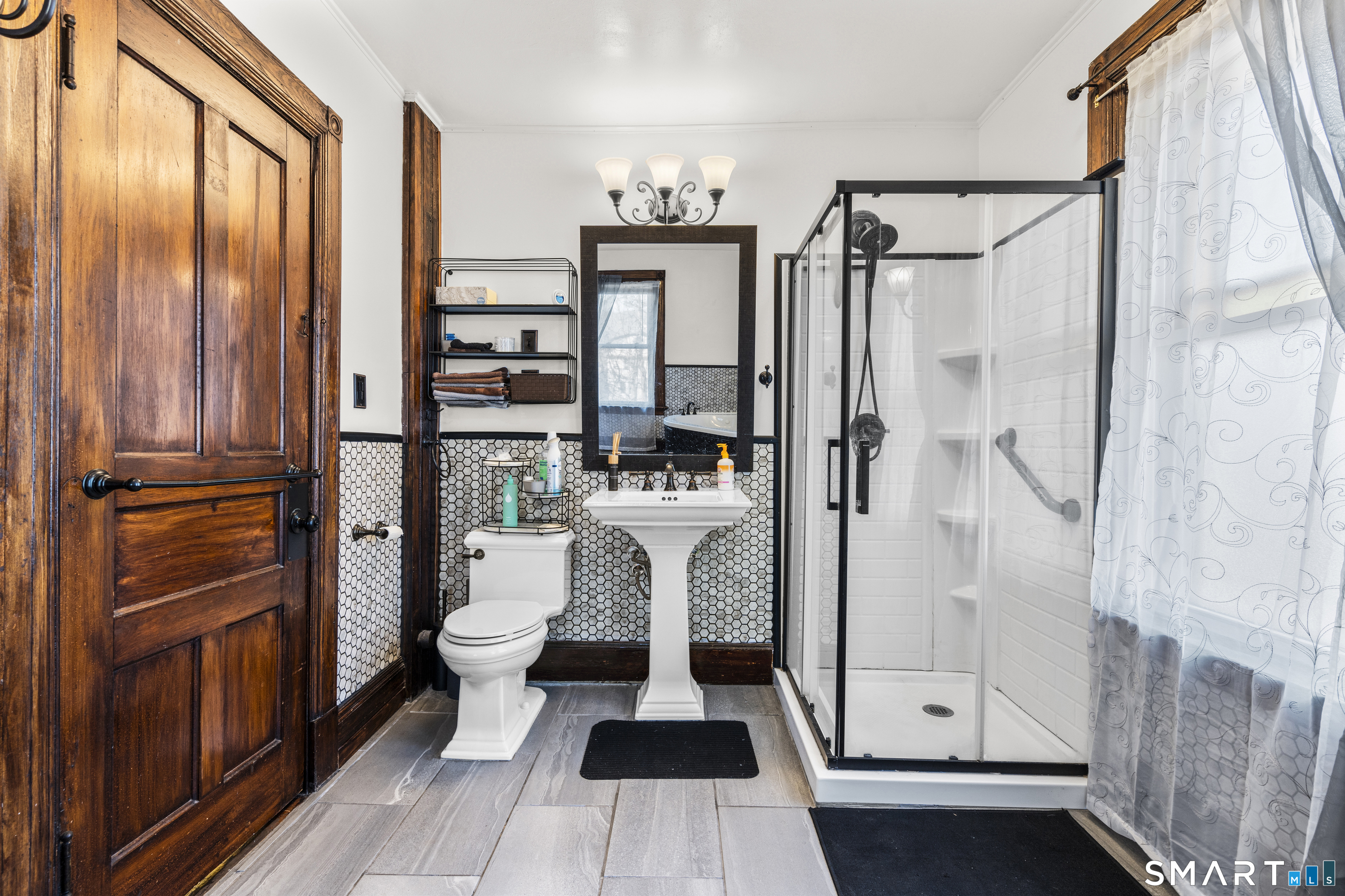 101 Wilcox Avenue Meriden, CT 06451 - Photo 29 of 43 a bathroom with a sink a toilet and shower