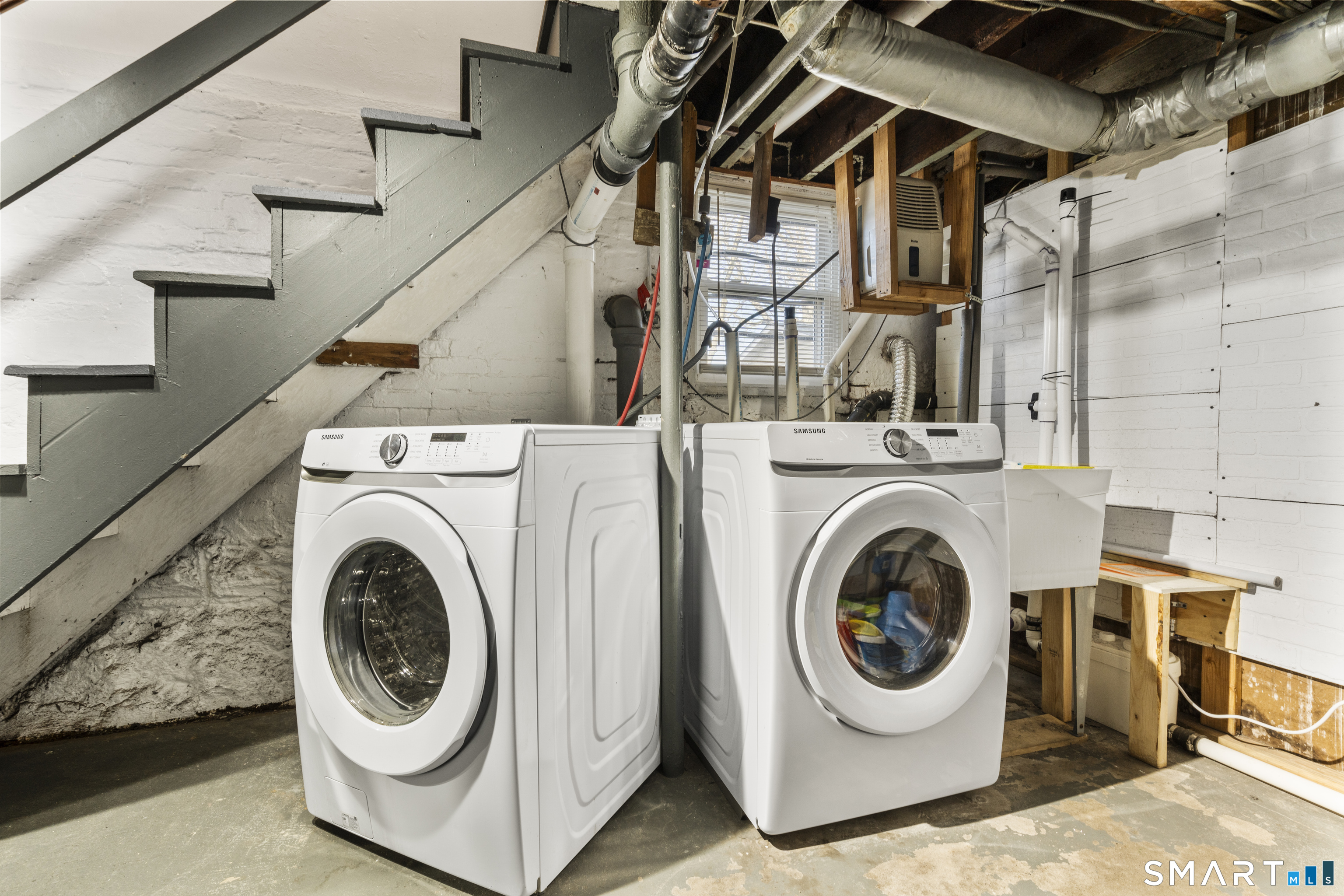 101 Wilcox Avenue Meriden, CT 06451 - Photo 34 of 43 a utility room with dryer and washer