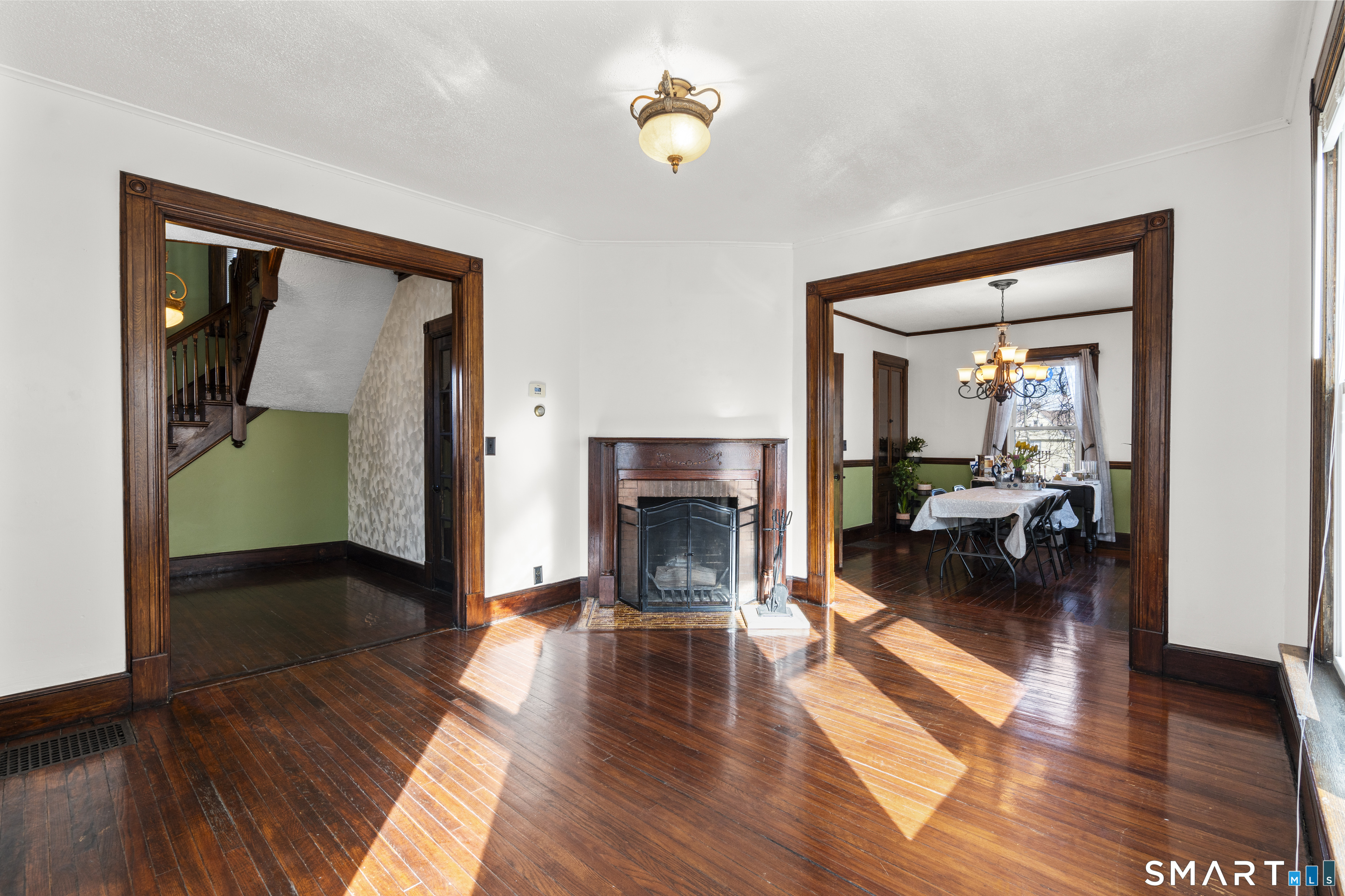 101 Wilcox Avenue Meriden, CT 06451 - Photo 35 of 43 a living room with furniture and a fireplace