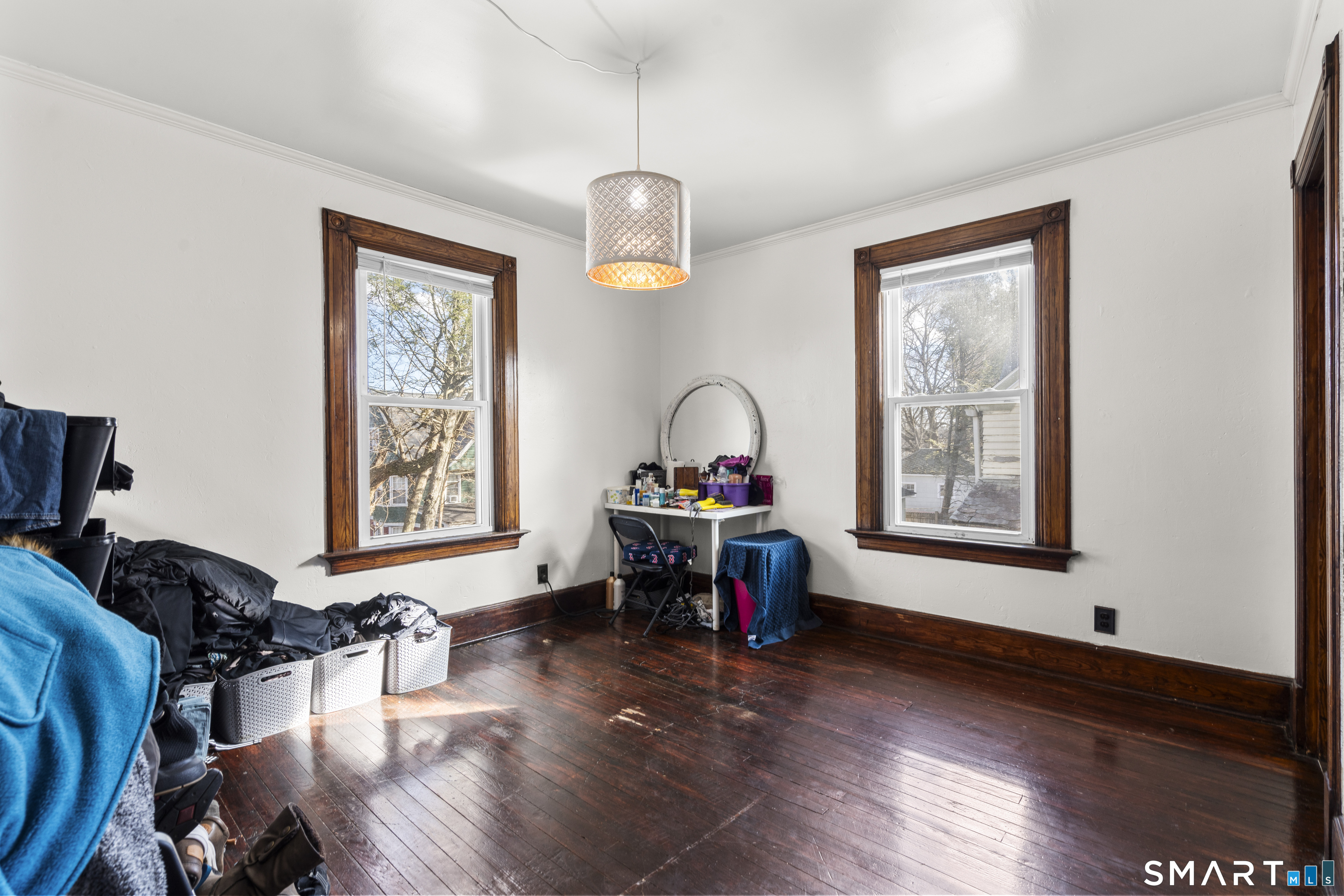 101 Wilcox Avenue Meriden, CT 06451 - Photo 38 of 43 a living room with furniture a window and gym equipment