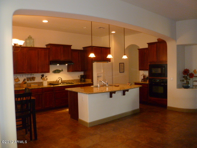15610 West Berkeley Road Goodyear, AZ 85395 - Photo 8 of 34 kitchen