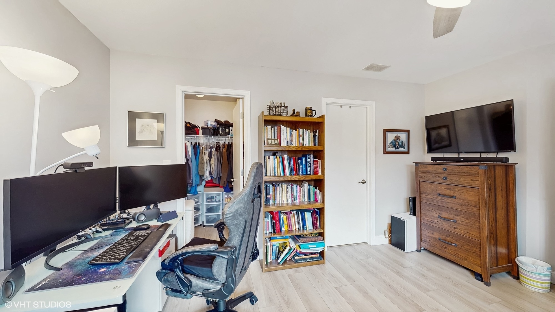 21202 Silktree Circle Plainfield, IL 60544 - Photo 11 of 25 a view of a workspace with furniture and wooden floor