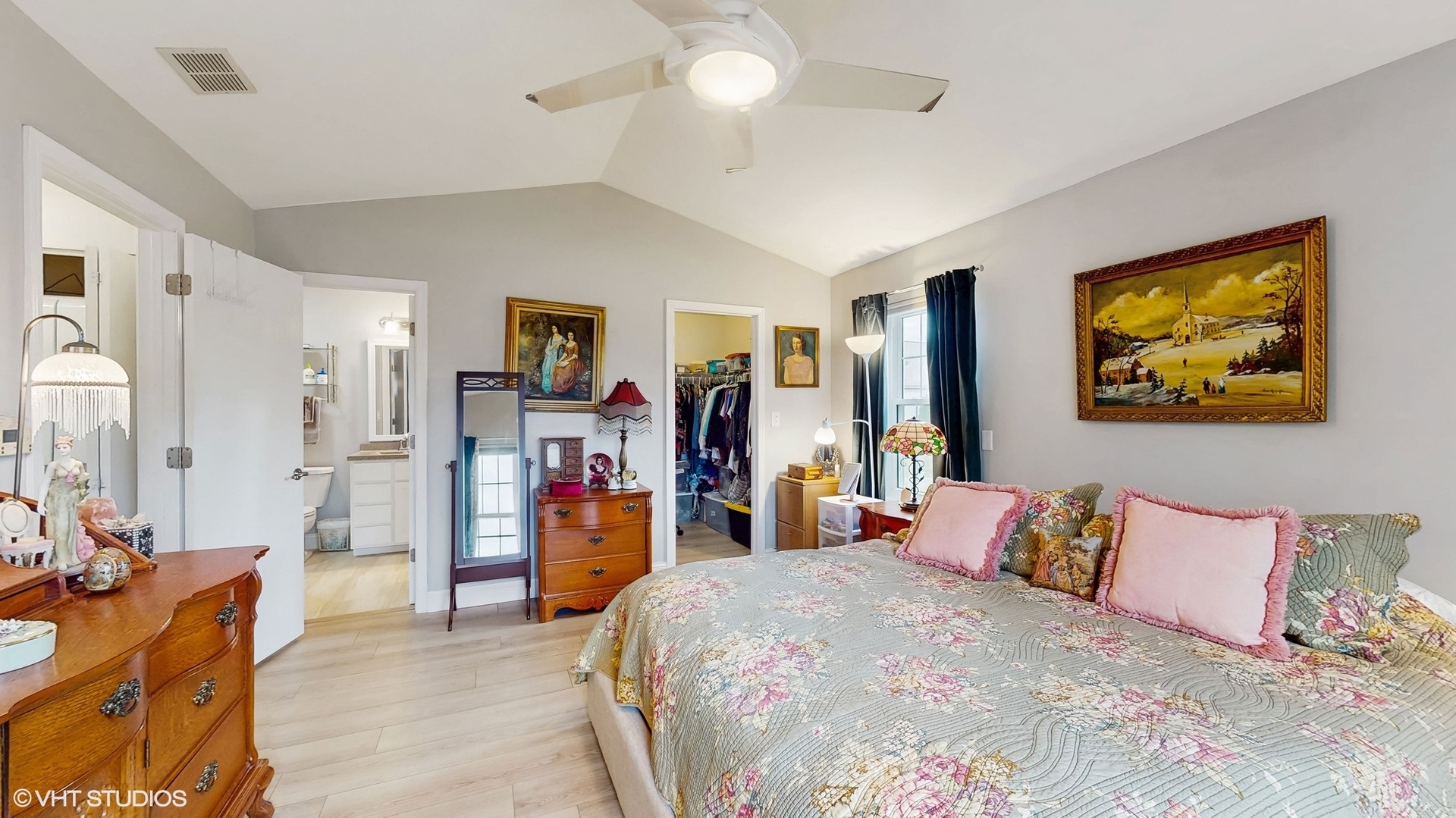 21202 Silktree Circle Plainfield, IL 60544 - Photo 16 of 25 a bed room with a bed and a walk in closet