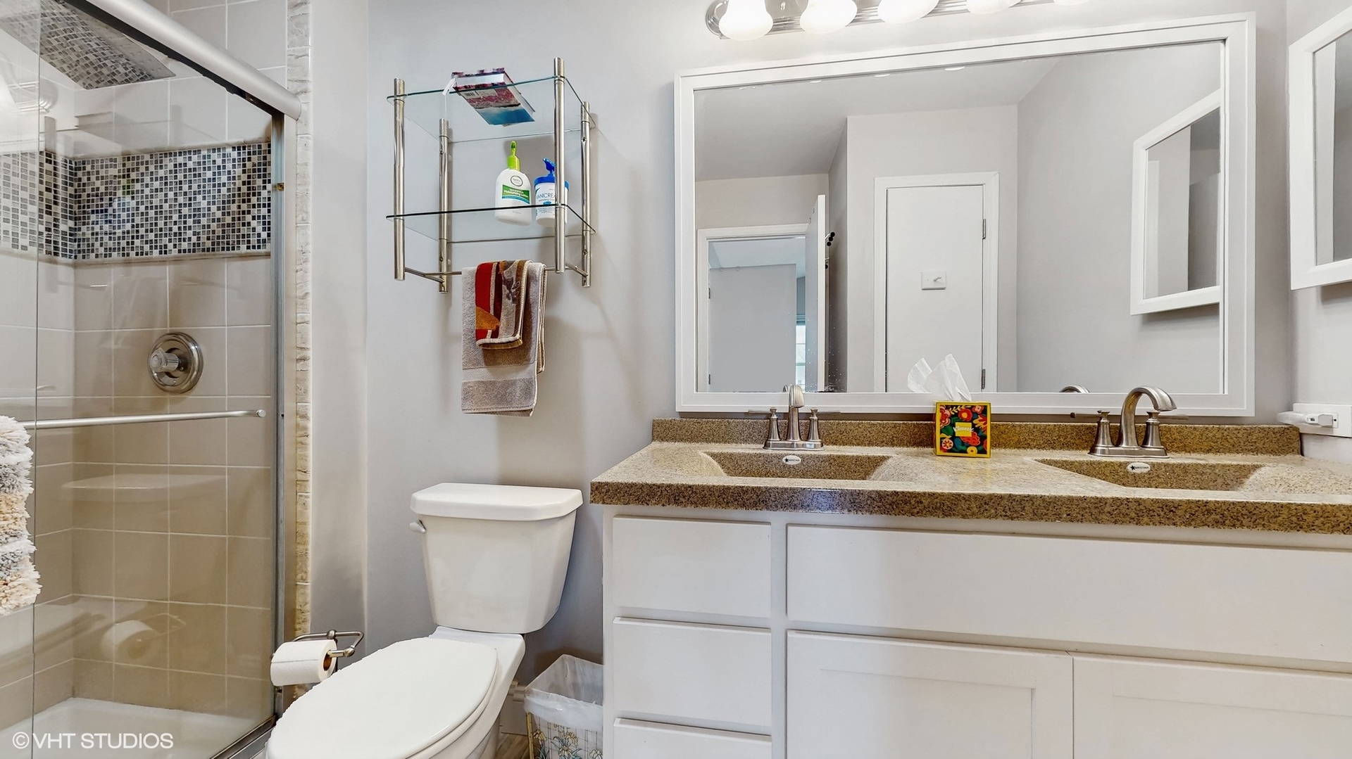21202 Silktree Circle Plainfield, IL 60544 - Photo 17 of 25 a bathroom with a granite countertop sink mirror vanity and toilet