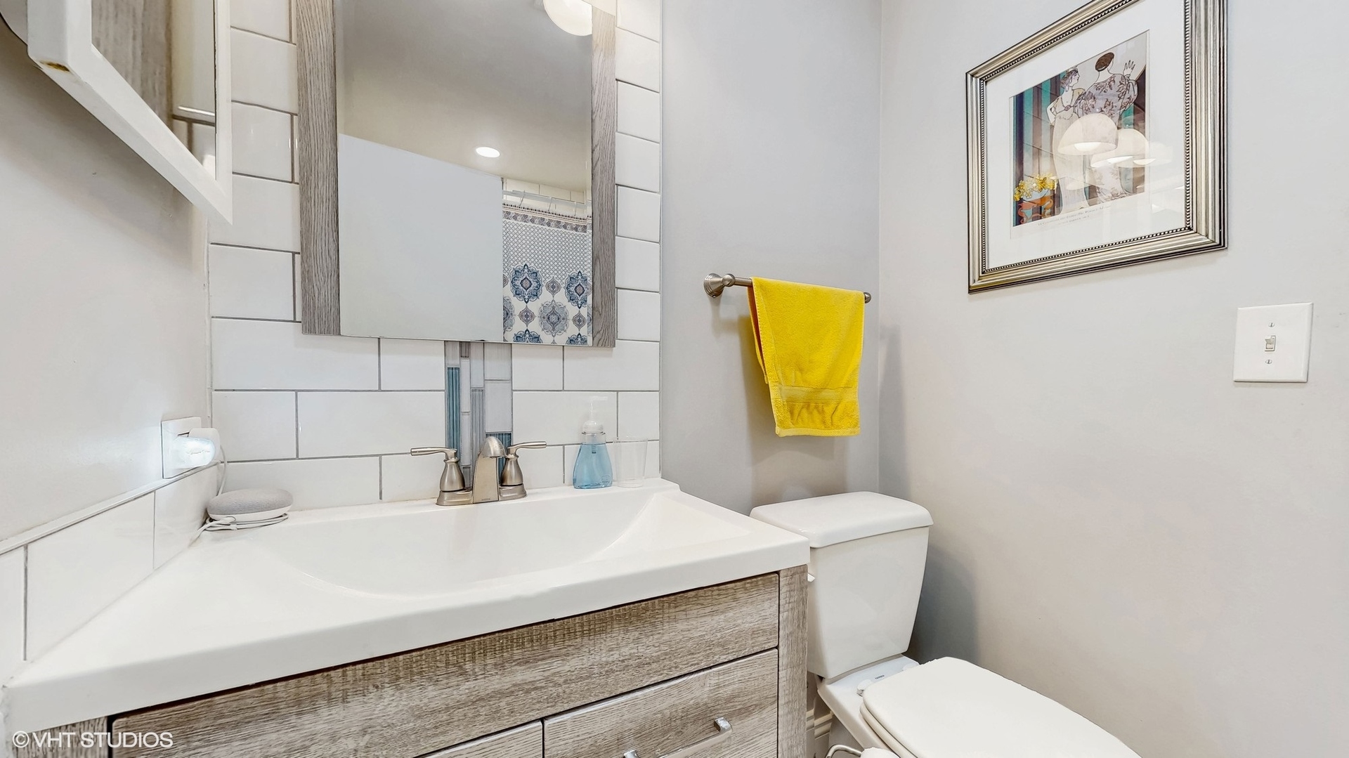 21202 Silktree Circle Plainfield, IL 60544 - Photo 18 of 25 a bathroom with a sink and a toilet
