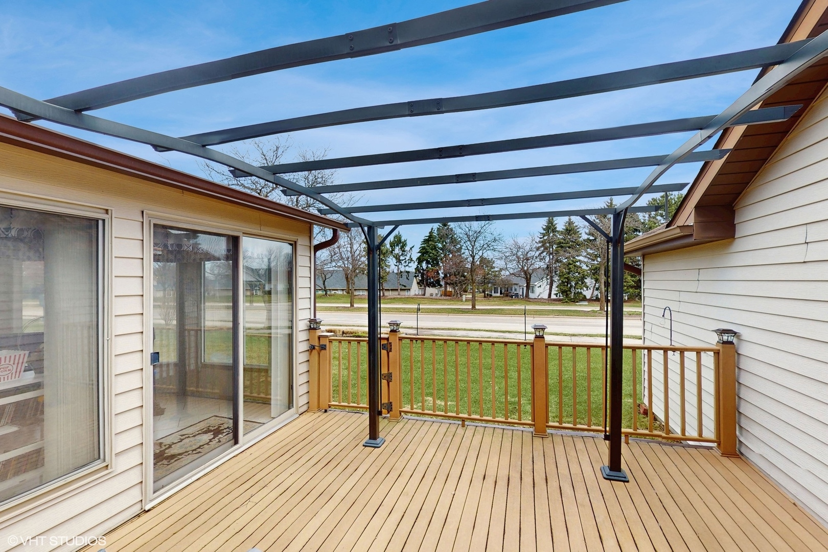 21202 Silktree Circle Plainfield, IL 60544 - Photo 22 of 25 a view of a balcony with wooden floor