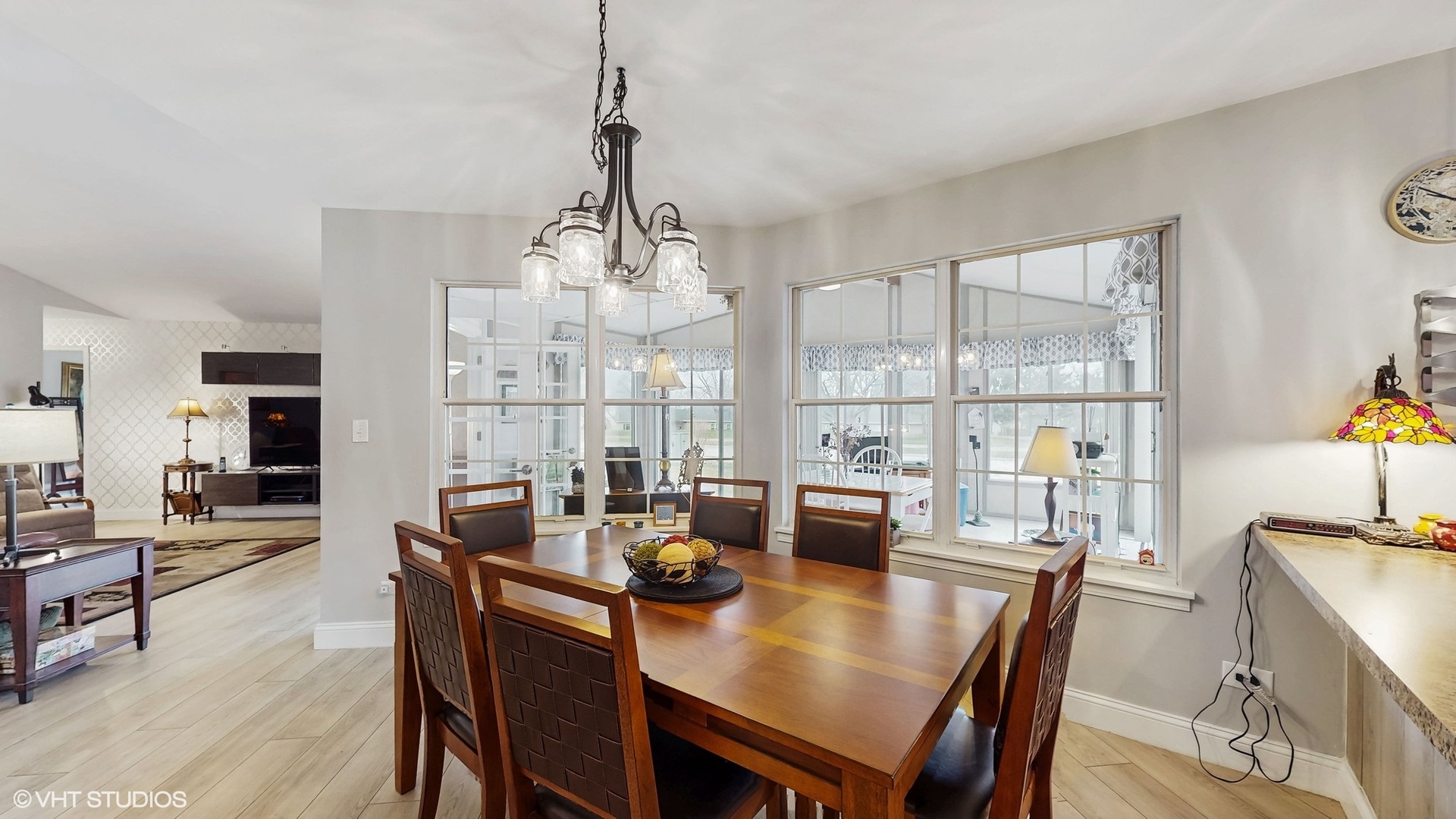 21202 Silktree Circle Plainfield, IL 60544 - Photo 6 of 25 a view of a dining room with furniture window and outside view