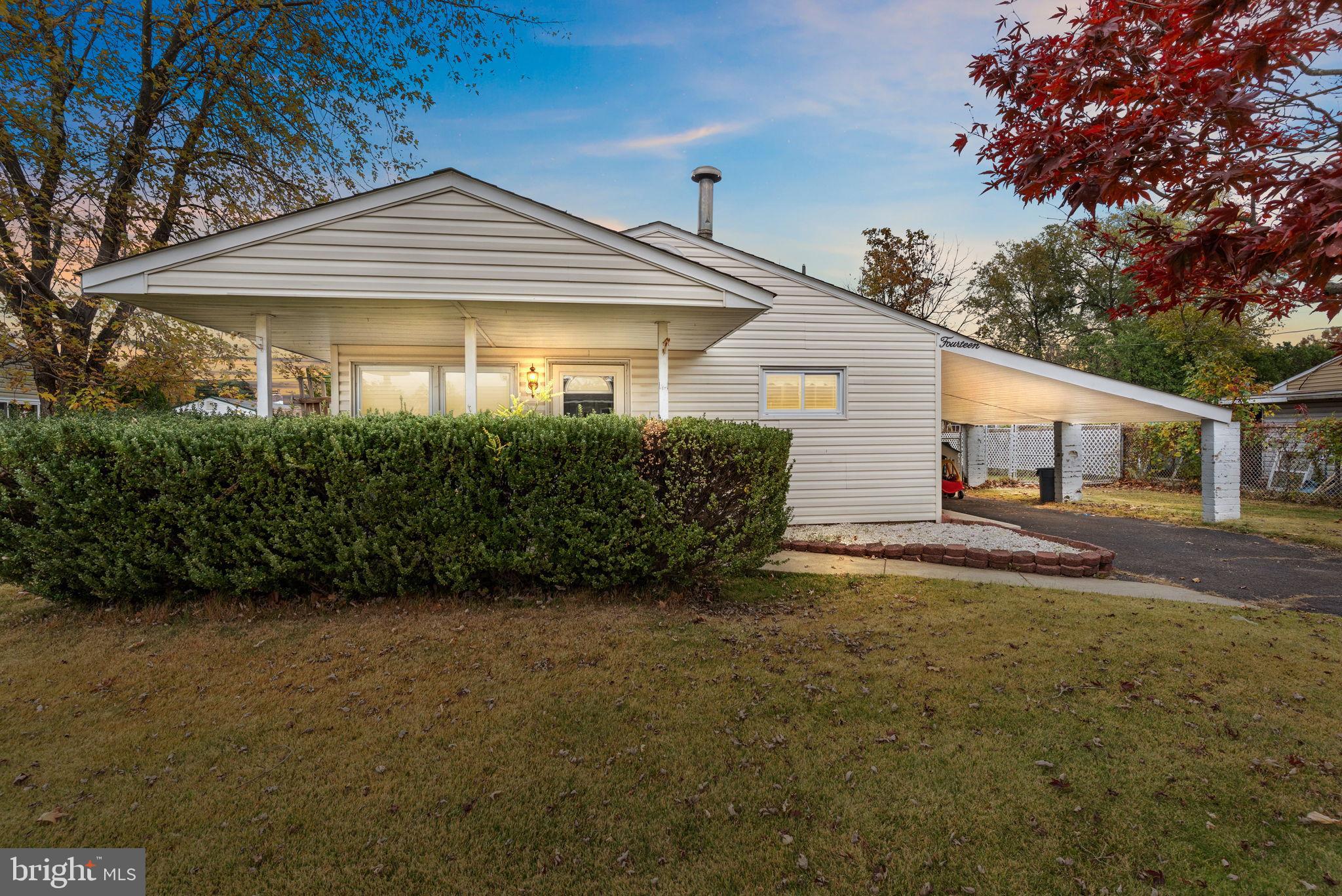 front view of a house with a small yard