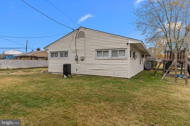 a house view with a backyard space