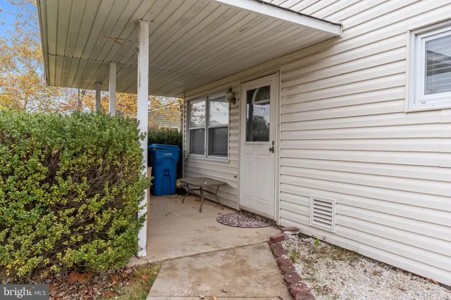 a view of a porch with a door