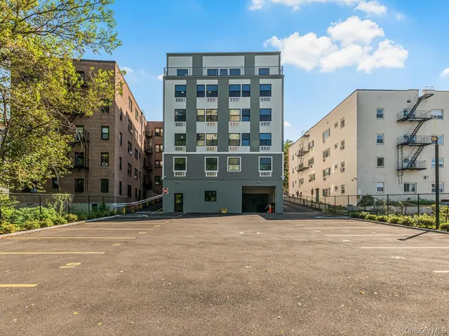 front view of a building with a street