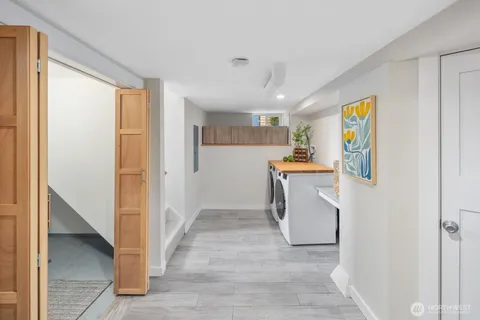 a view of a kitchen with storage and utility