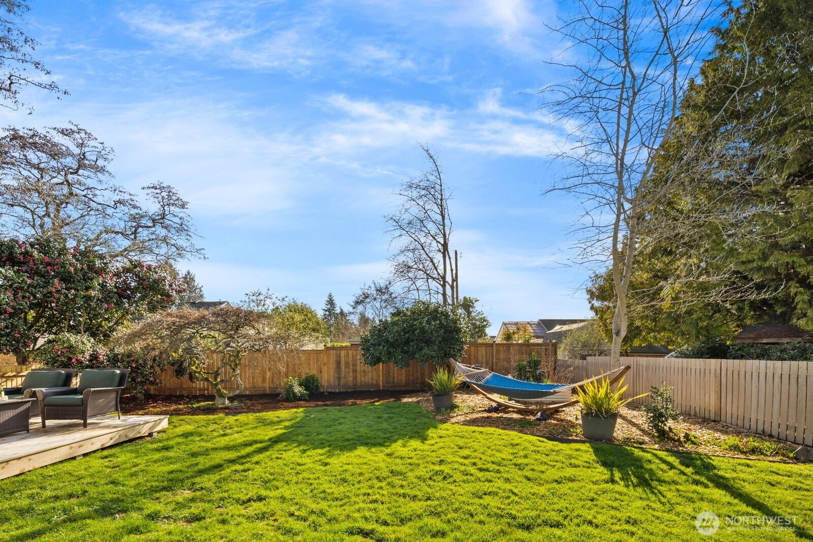 7941 30th Avenue Southwest Seattle, WA 98126 - Photo 33 of 37 a view of a bench in a backyard