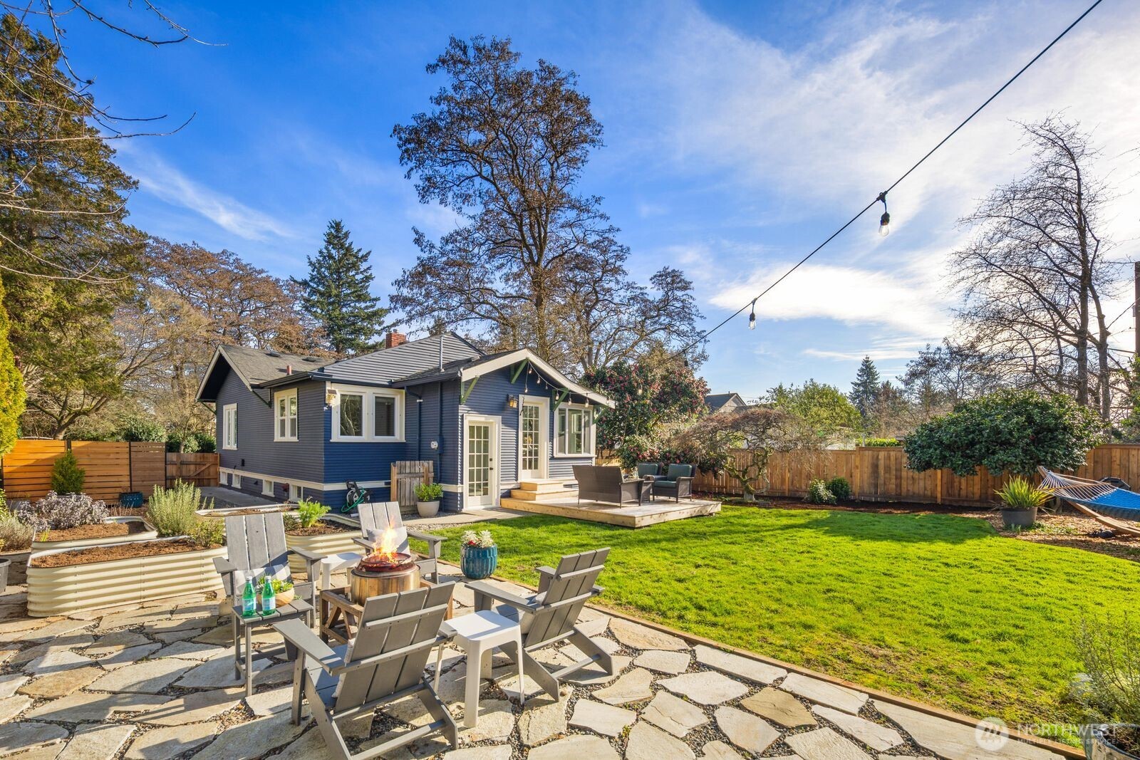 7941 30th Avenue Southwest Seattle, WA 98126 - Photo 37 of 37 a front view of a house with garden