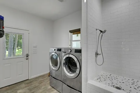 a utility room with dryer and washer