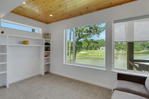 a view of a livingroom with a large window