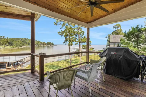 a view of a balcony with furniture