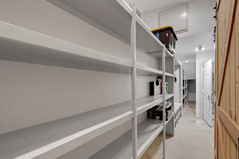 a hallway with cabinets