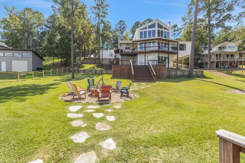 a view of a swimming pool with a table and chairs