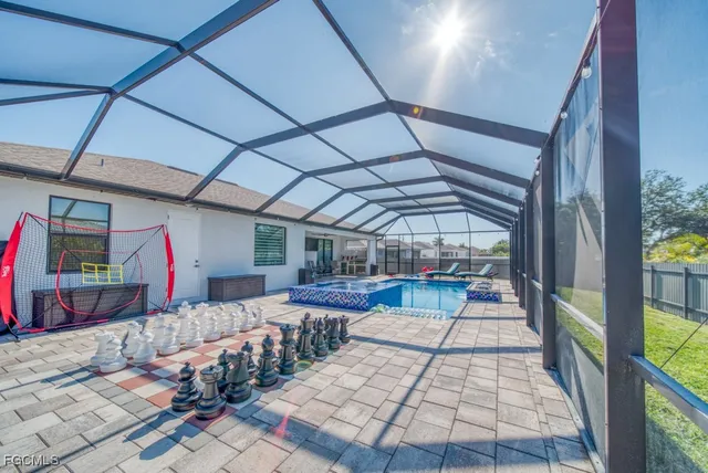 aerial view of a house with a yard