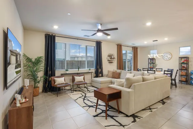 a view of a dining room with furniture window and outside view