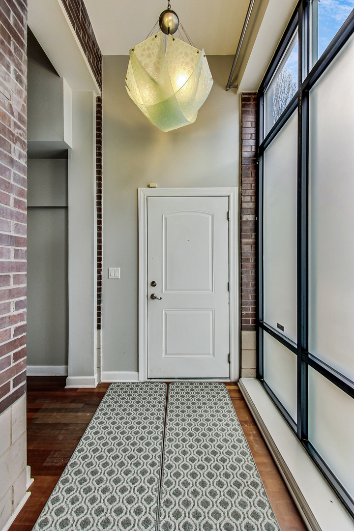 2122 West Rice Street, Unit 1 Chicago, IL 60622 - Photo 20 of 22 a view of a hallway