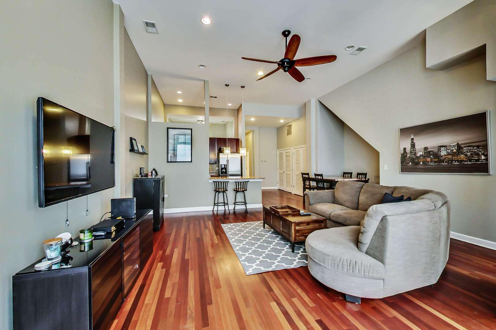 2122 West Rice Street, Unit 1 Chicago, IL 60622 - Photo 3 of 22 a living room with furniture and a flat screen tv