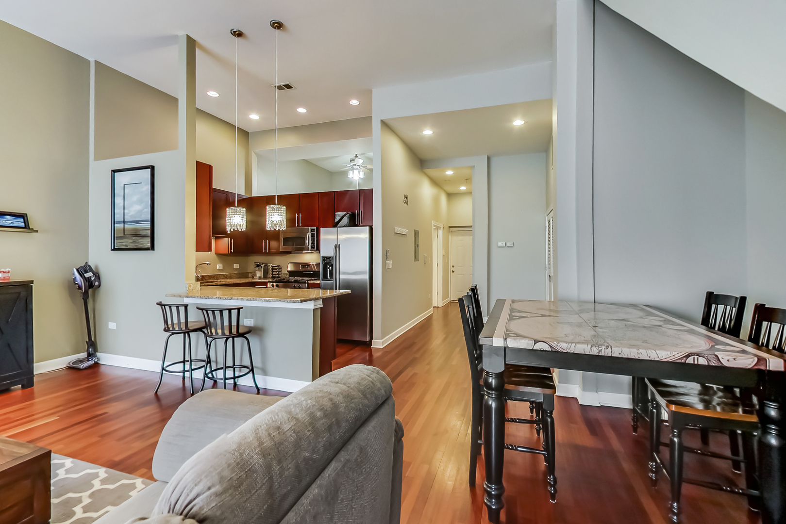 2122 West Rice Street, Unit 1 Chicago, IL 60622 - Photo 7 of 22 a kitchen with a table and chairs in it