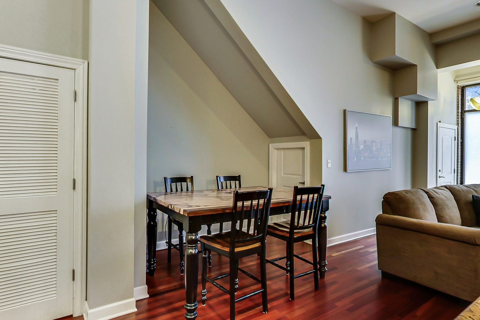 2122 West Rice Street, Unit 1 Chicago, IL 60622 - Photo 8 of 22 a living room with furniture and wooden floor