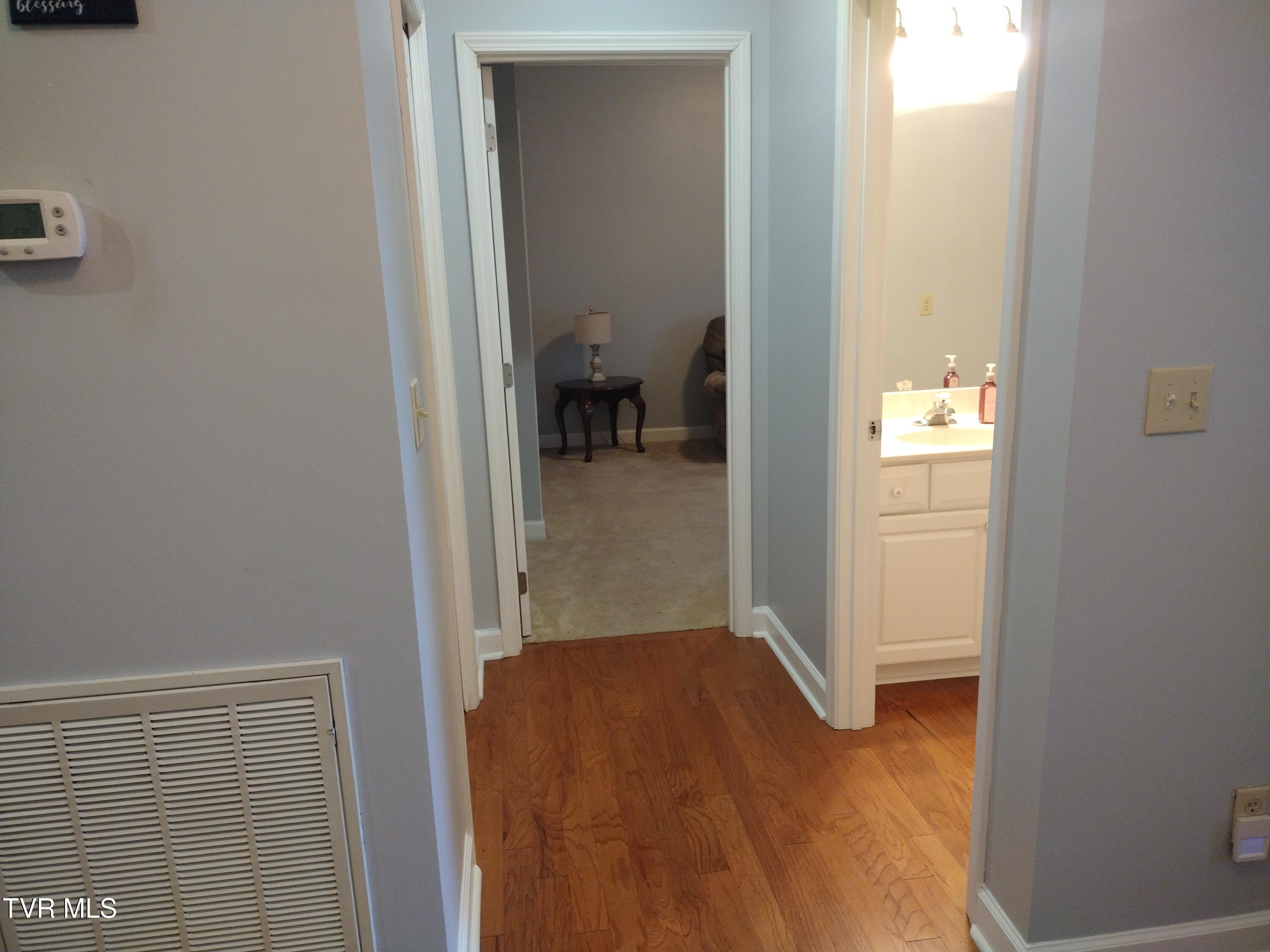 254 Regency Park, Unit 254 Greeneville, TN 37745 - Photo 20 of 36 Hallway going into the bedroom 2