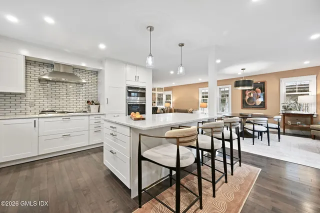 a kitchen with appliances and cabinets