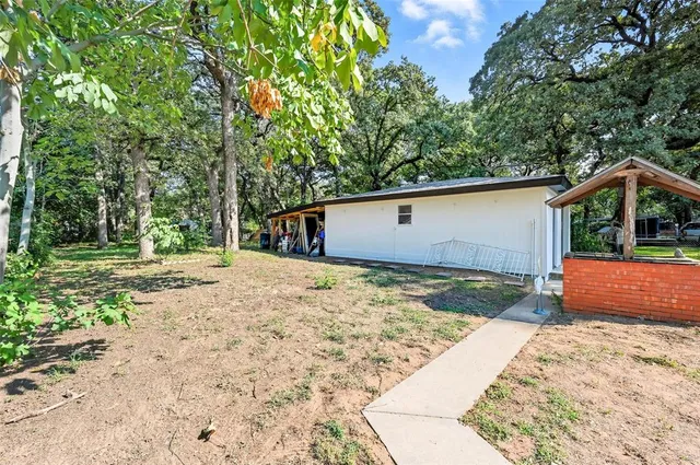 a view of backyard of house