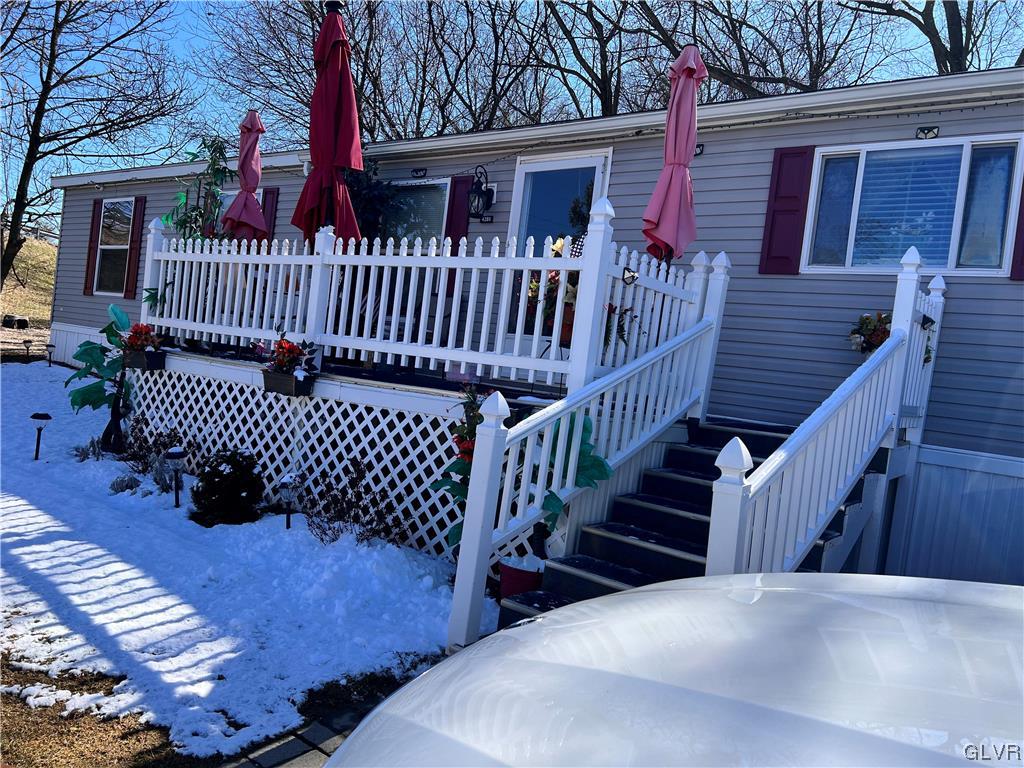 4205 Leopard Circle Orefield, PA 18069 - Photo 2 of 20 a view of a deck with a wooden fence