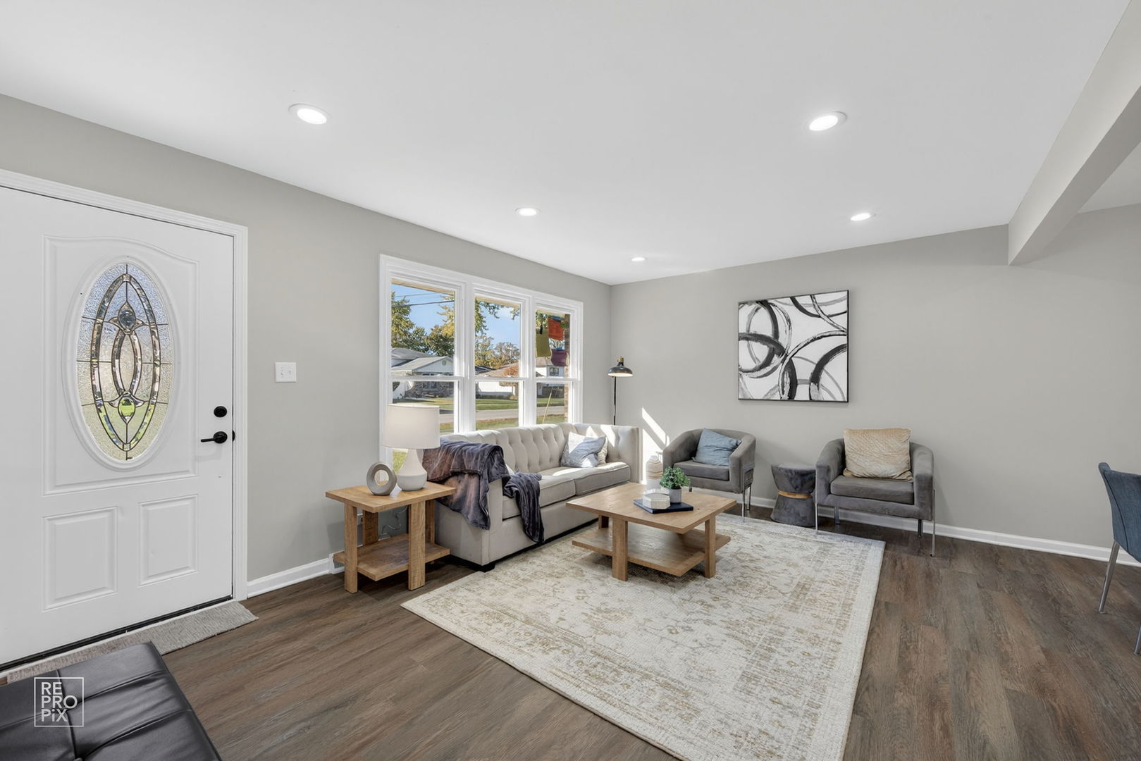 15021 Kenton Avenue Midlothian, IL 60445 - Photo 2 of 10 a living room with furniture and a window