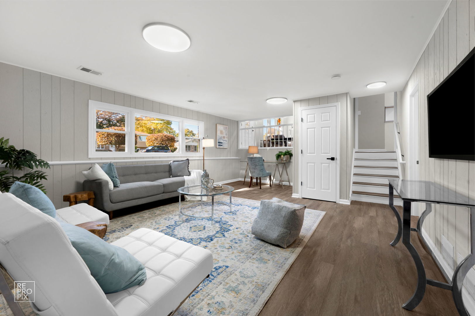 15021 Kenton Avenue Midlothian, IL 60445 - Photo 8 of 10 a living room with furniture and a flat screen tv