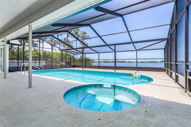 a view of a swimming pool with a patio