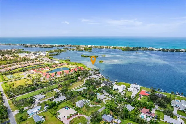 swimming pool view with a lake view