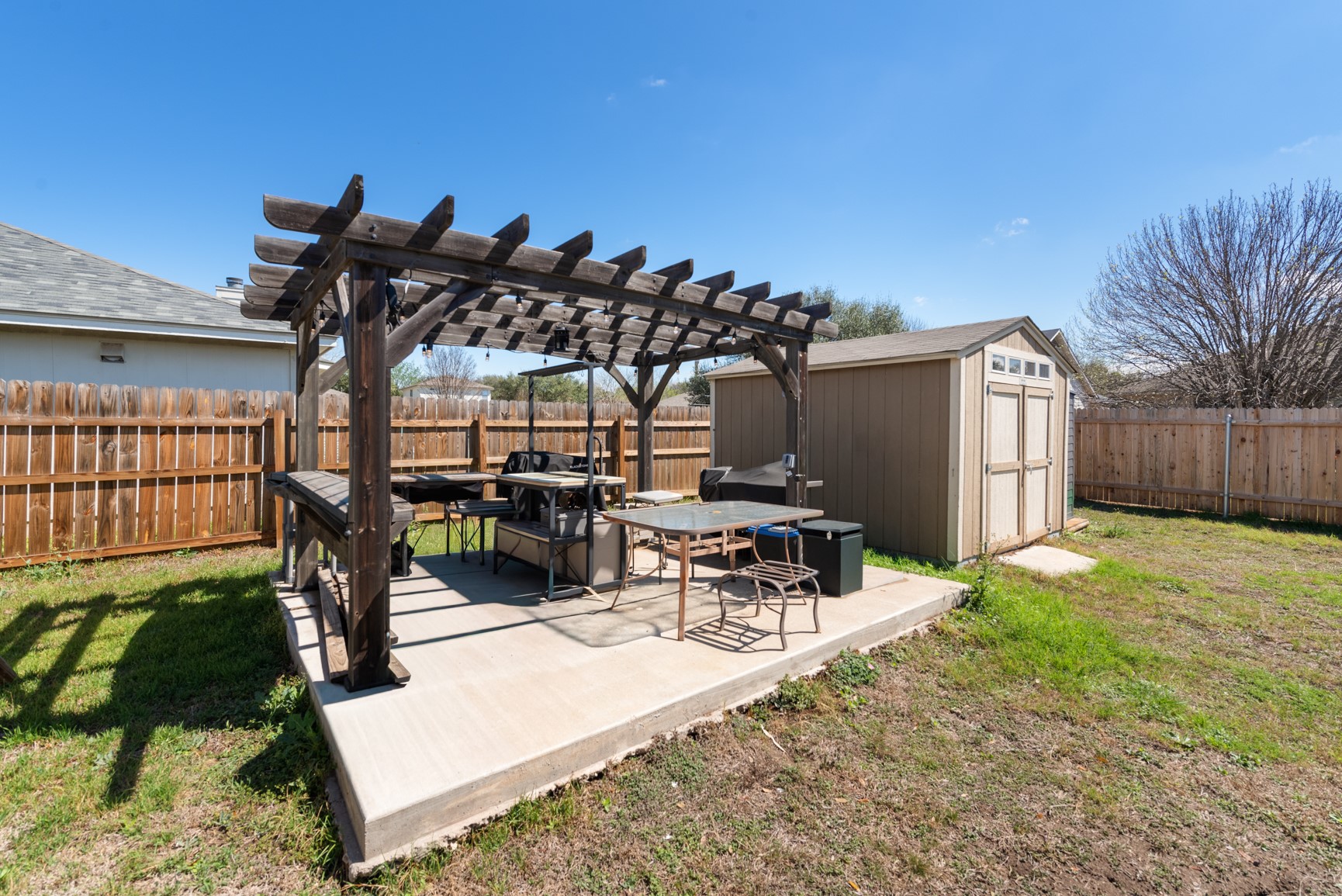 5501 English Avenue Austin, TX 78724 - Photo 14 of 19 a view of a backyard with a patio