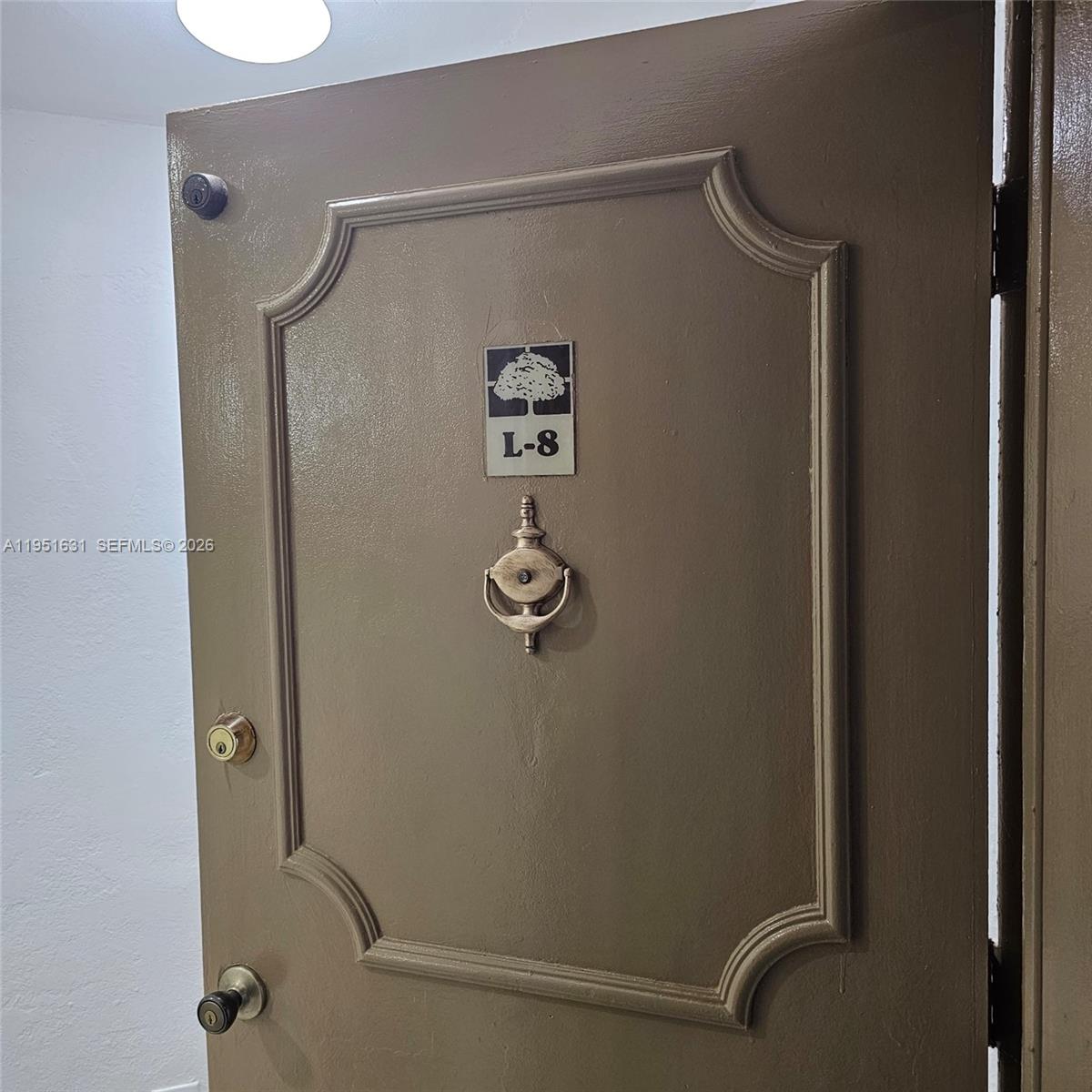 9402 Southwest 77th Avenue, Unit L8 Miami, FL 33156 - Photo 2 of 54 a bathroom with a shower