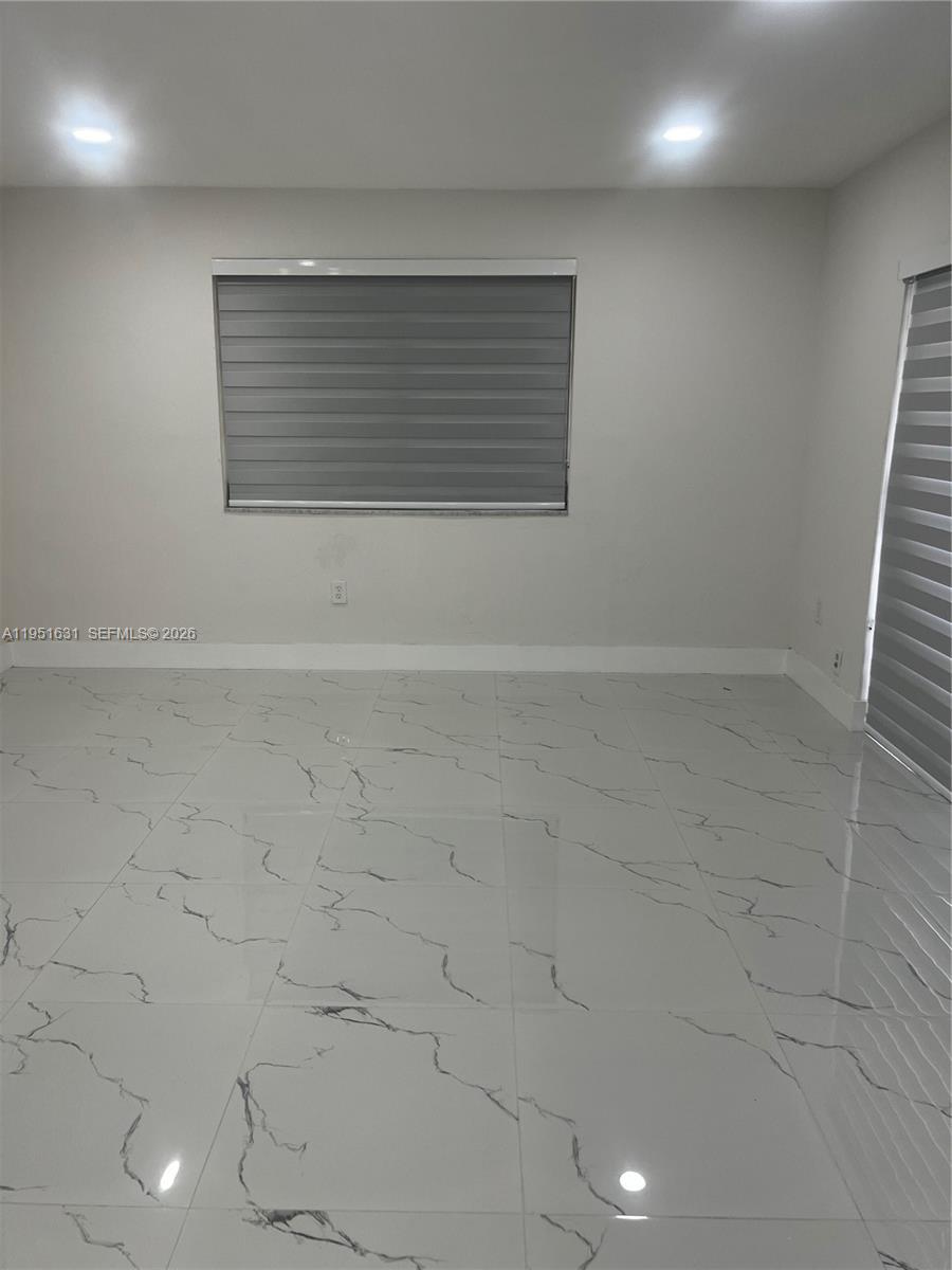 9402 Southwest 77th Avenue, Unit L8 Miami, FL 33156 - Photo 34 of 54 a view of an empty room