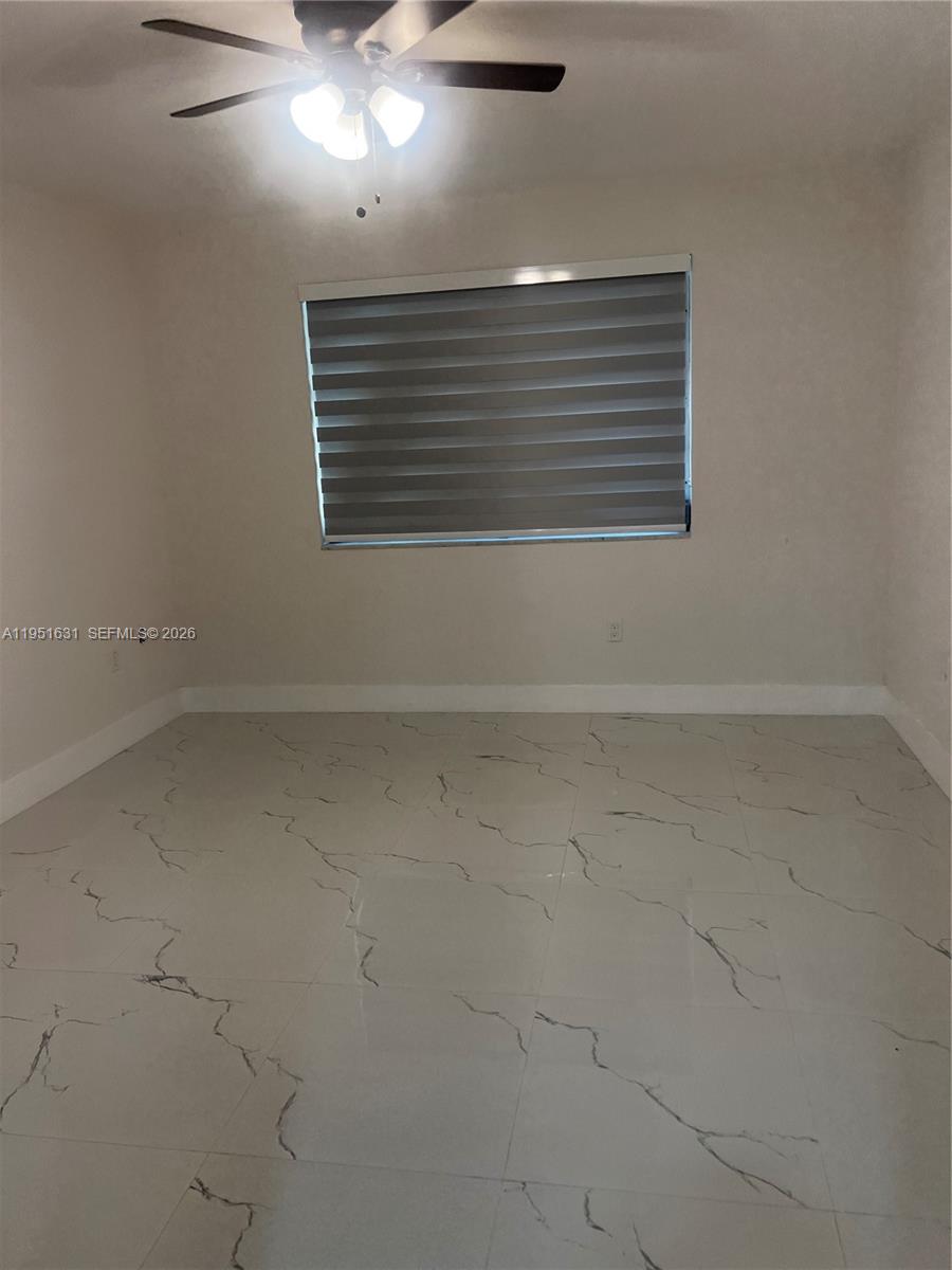 9402 Southwest 77th Avenue, Unit L8 Miami, FL 33156 - Photo 40 of 54 a view of empty room