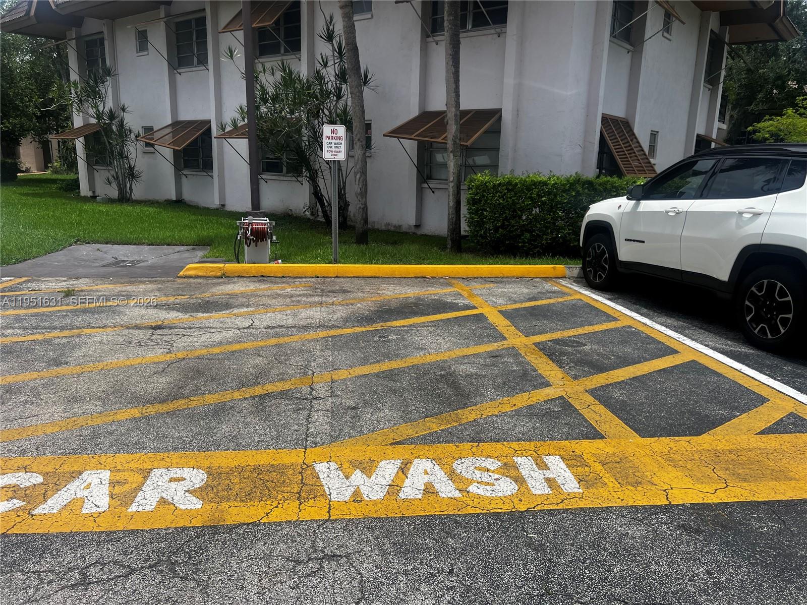 9402 Southwest 77th Avenue, Unit L8 Miami, FL 33156 - Photo 53 of 54 a view of swimming pool with yard