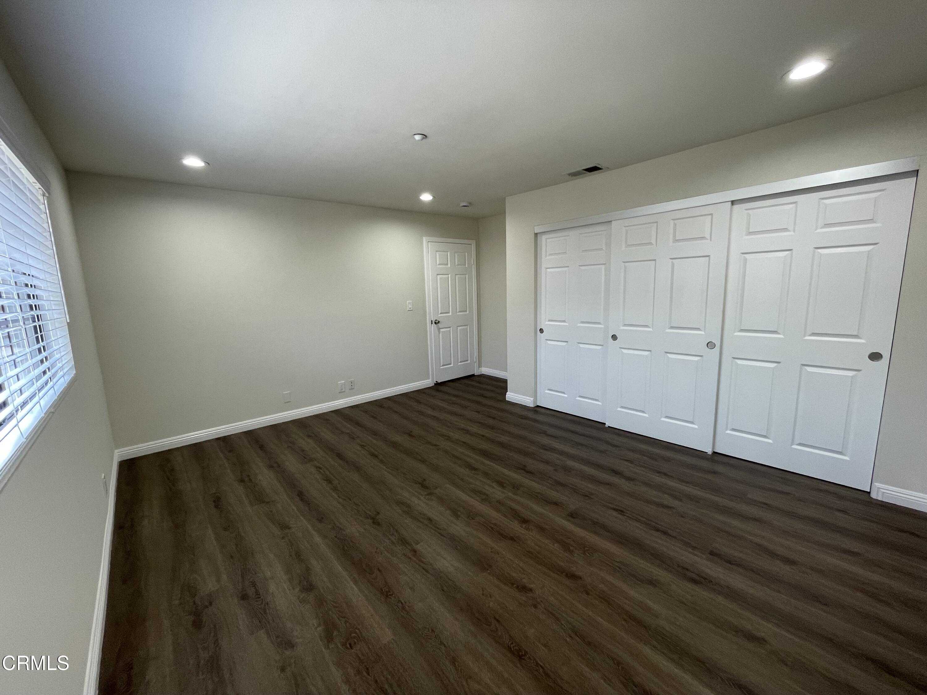 838 Fairview Avenue, Unit N Arcadia, CA 91007 - Photo 12 of 14 wooden floor in an empty room with a window
