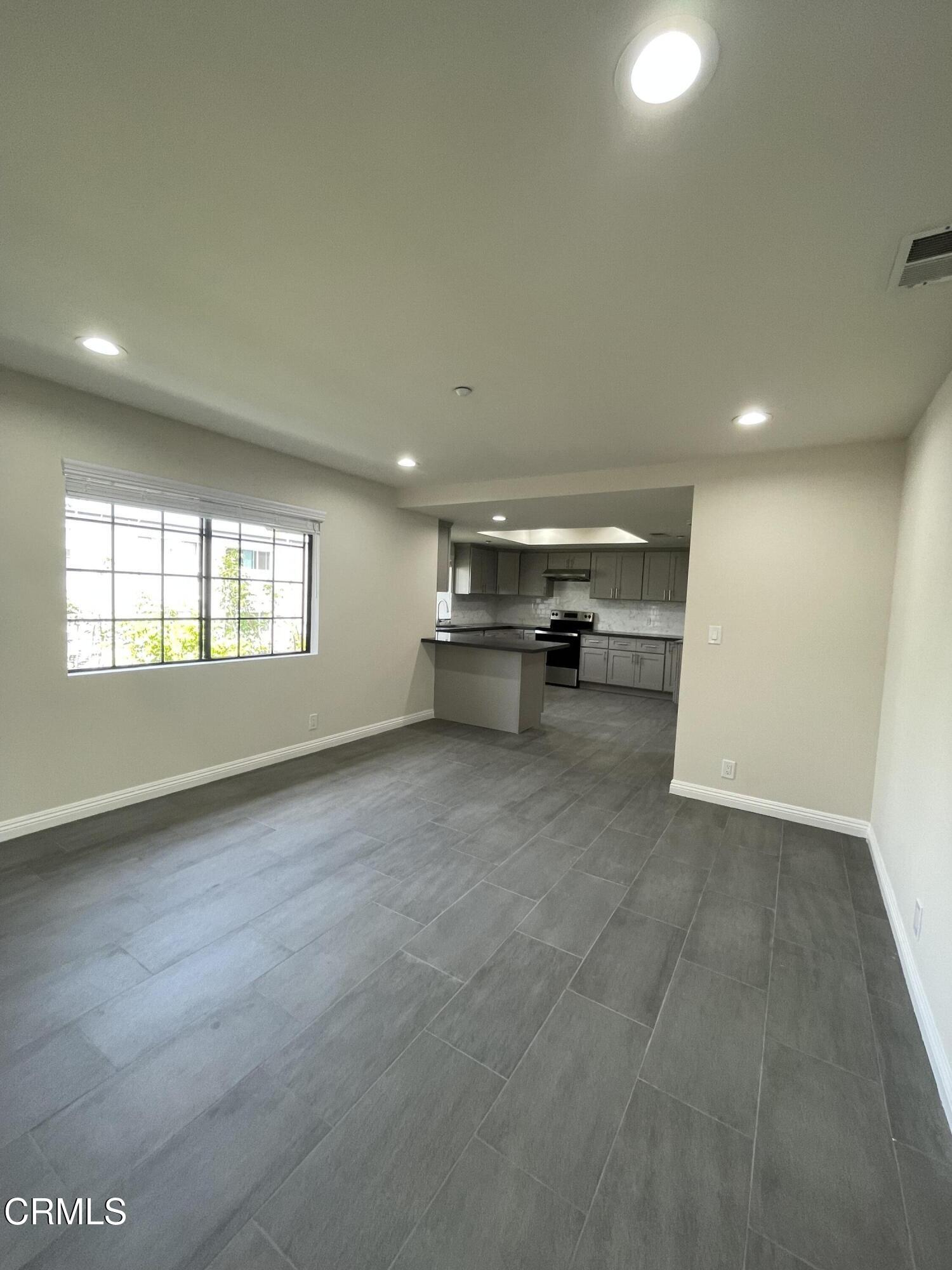 838 Fairview Avenue, Unit N Arcadia, CA 91007 - Photo 6 of 14 a view of empty room with a window