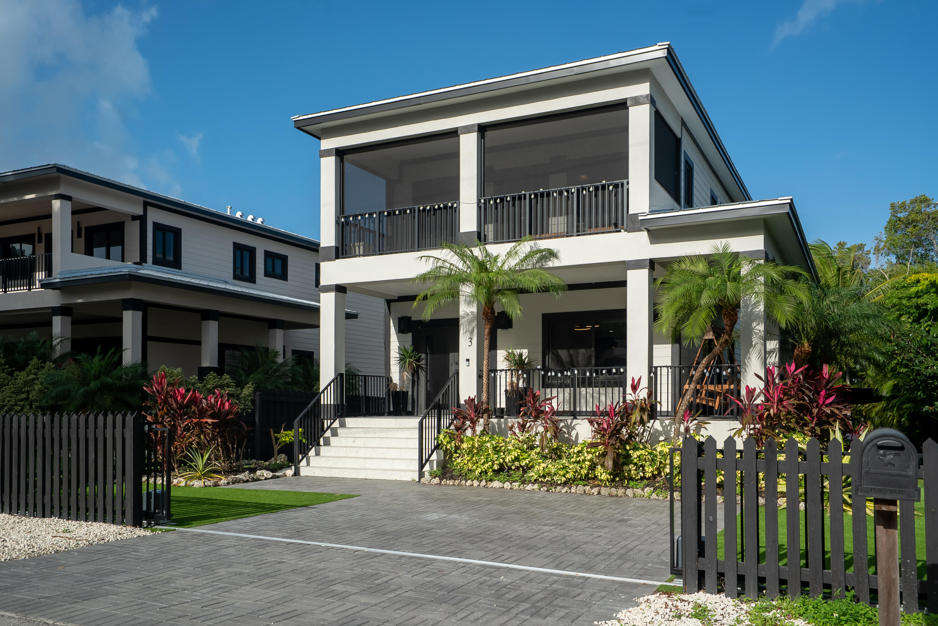 13 Coral Way Key Largo, FL 33037 - Photo 31 of 34 a view of a house with potted plants