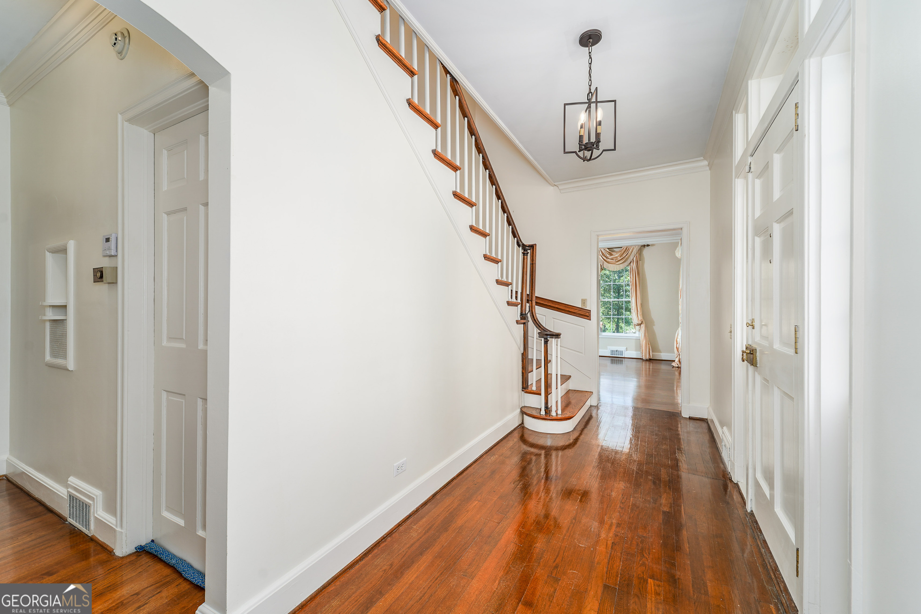 1602 Ward St Extension West Douglas, GA 31533 - Photo 17 of 70 a view of a hallway with wooden floor and staircase