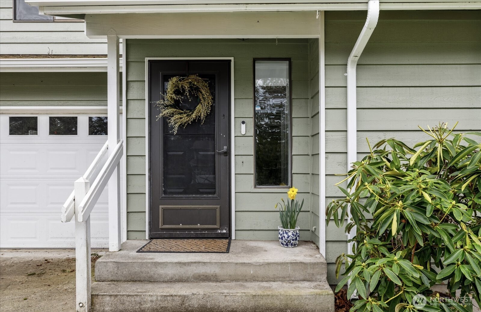 1282 Northwest Lanyard Loop, Unit 2 Oak Harbor, WA 98277 - Photo 3 of 32 a view of a entryway door of the house