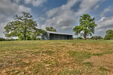 a view of house with garden space