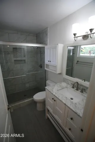 a view of a swimming pool with a chair