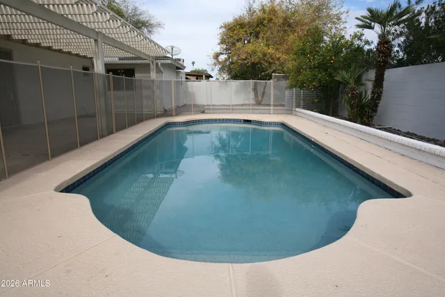 a view of a small house in the background